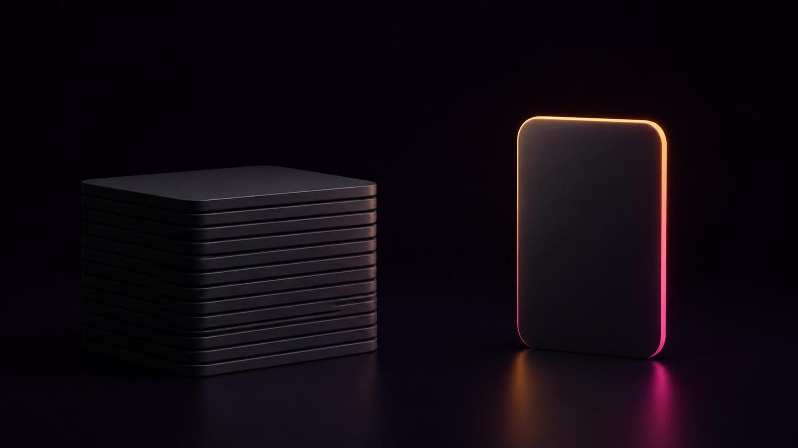 A stack of twelve identical dark cards beside one upright card whose edge glows amber to magenta.